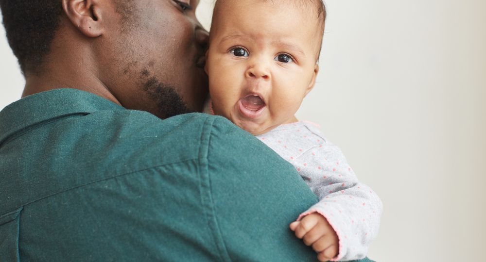 African Father Holding Baby