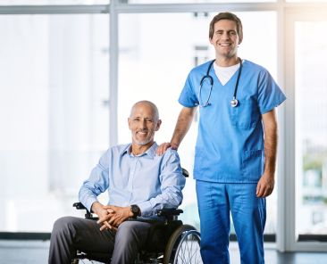 The kind of care I can depend on. Portrait of a male nurse caring for a senior patient in a wheelchair